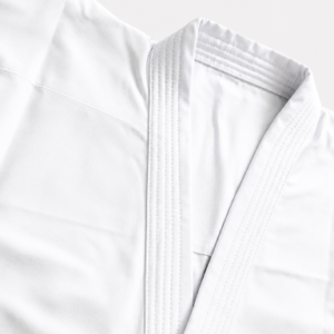 Close-up detail of the reinforced collar stitching and lightweight fabric texture on the Shureido New Wave NW-1 Kumite jacket