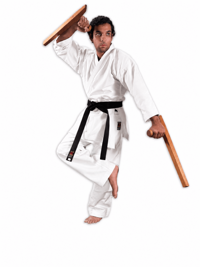 Traditional pair of Shureido Okinawan wooden tonfa martial arts weapons displayed with detailed handles and rounded side grips against a white background.